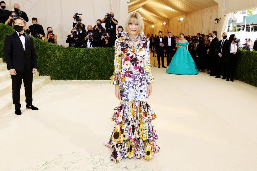 Vogue chief Dame Anna Wintour in a floral Oscar de la Renta dress