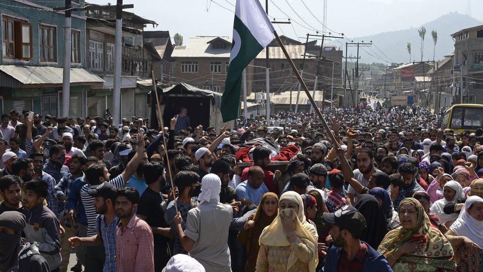 Mourners carry the body of the dead youth - 2 June