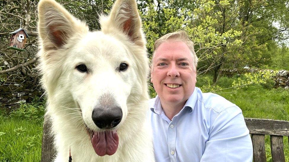 George Greer with his dog, Noah