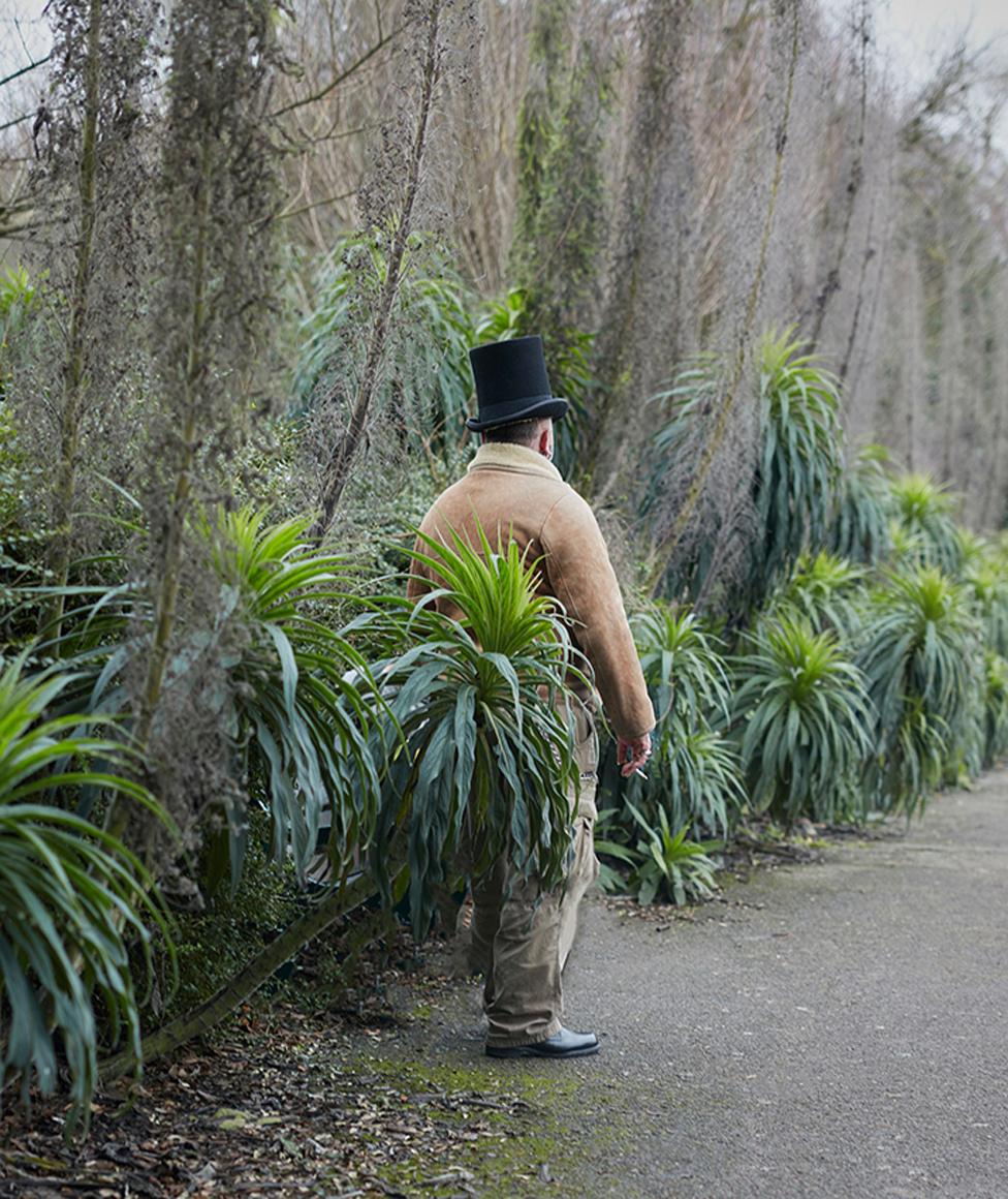 A man wearing a top hat