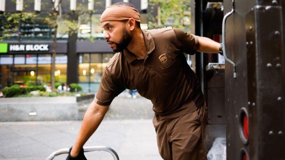 A UPS driver at work