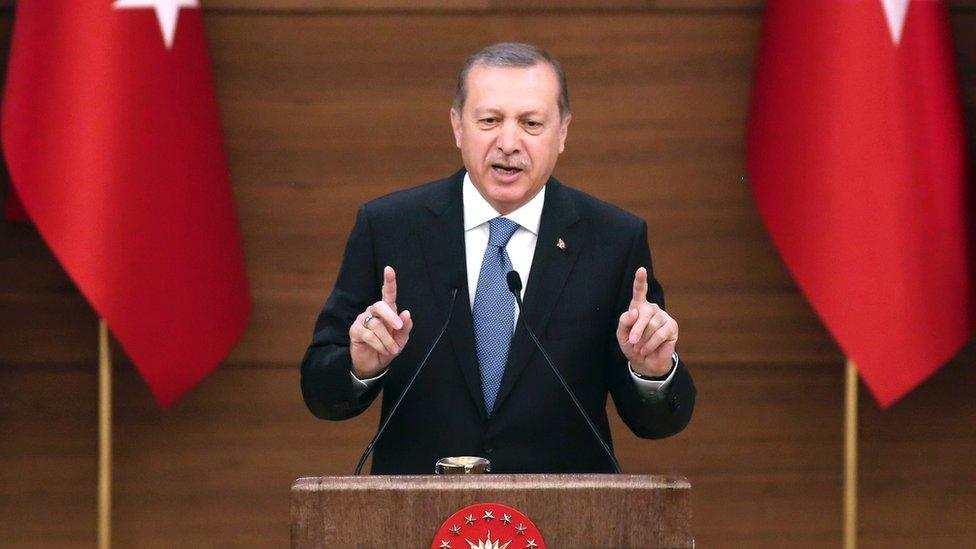 Turkey"s President Recep Tayyip Erdogan delivers a speech during the mukhtars meeting at the Presidential Complex in Ankara on April 19, 2016.