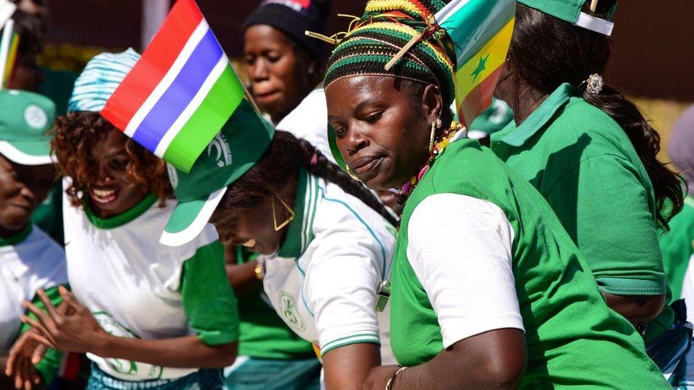 Woman with flags dancing