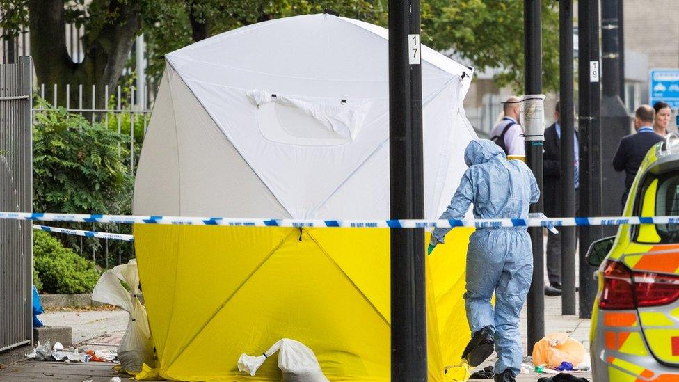 Police at scene of stabbing in London