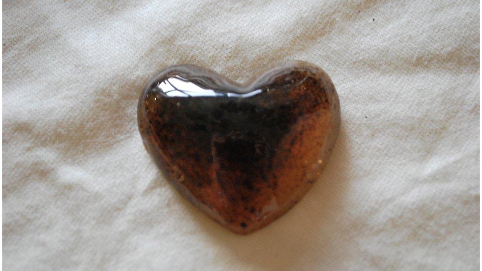 A heart shape keepsake stone made from placenta