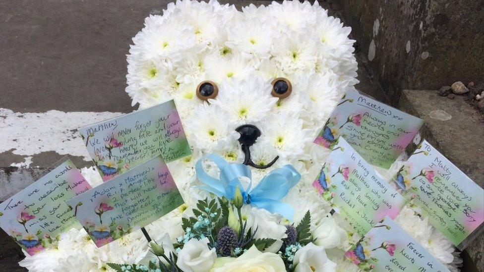 Flower teddy at funeral