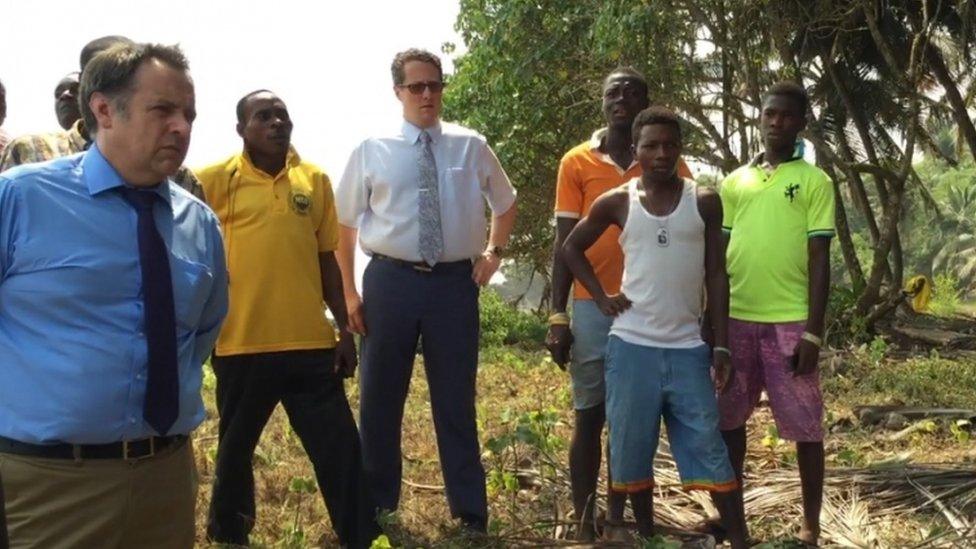 Members of the Metropolitan Police at a beach in Ghana