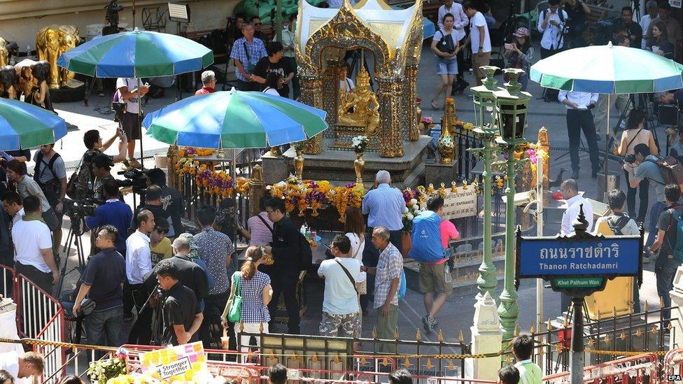 Visitors and journalists at shrine