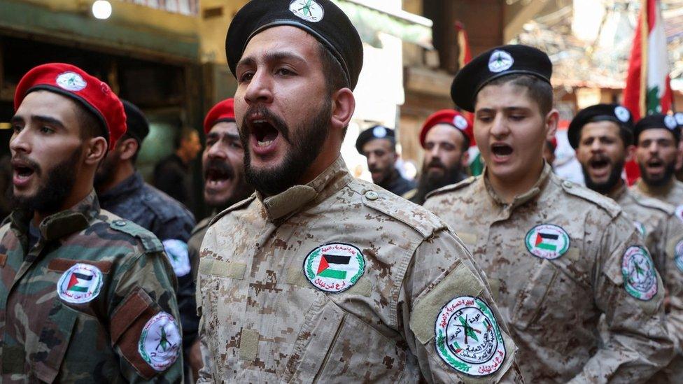 File photo showing members of the Popular Front for the Liberation of Palestine-General Command (PFLP-GC) marching during a parade in Burj al-Barajneh Palestinian refugee camp in Beirut, Lebanon (14 April 2023)