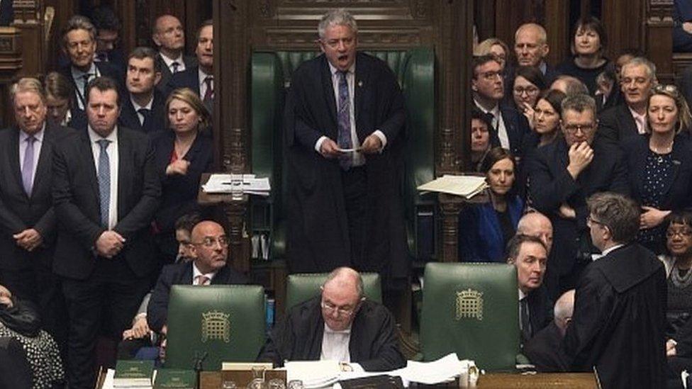 John Bercow surrounded by MPs in the House of Commons