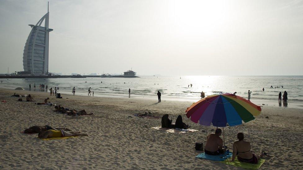 Beachgoers in Dubai