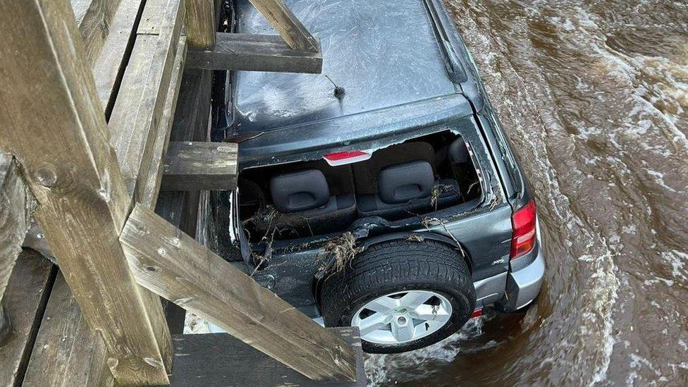 Car in flood waters