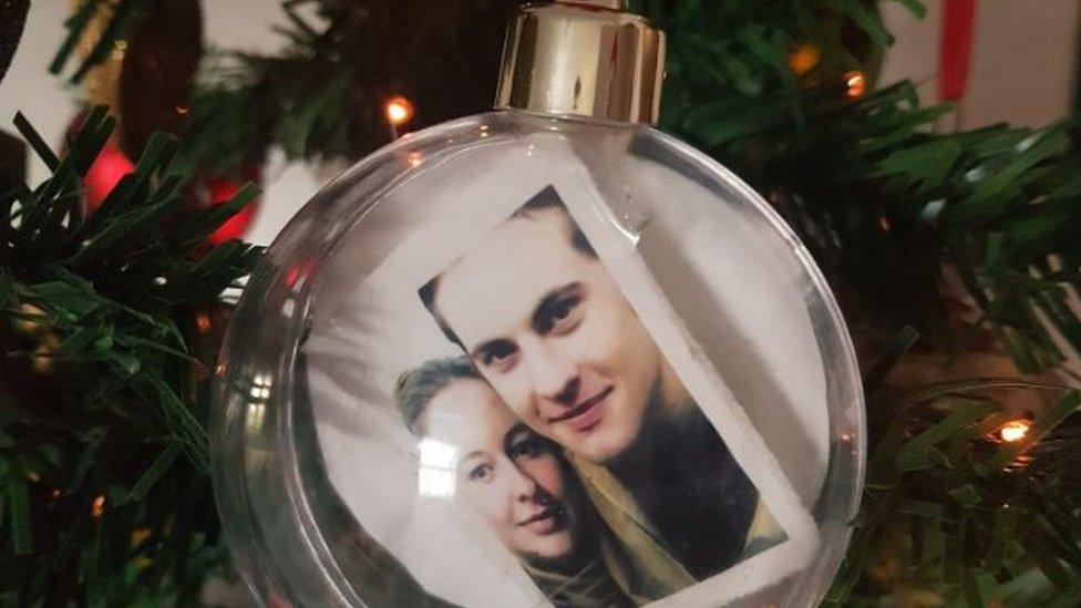 A bauble with a couple's photo inside