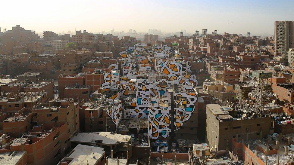 El Seed's Perceptions mural in Cairo