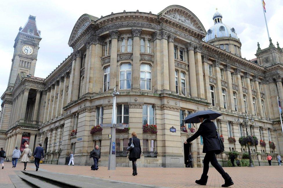 People walk past Birmingham's Council House