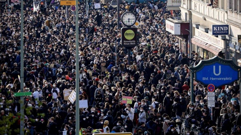 People gather for a protest on May Day in Berlin