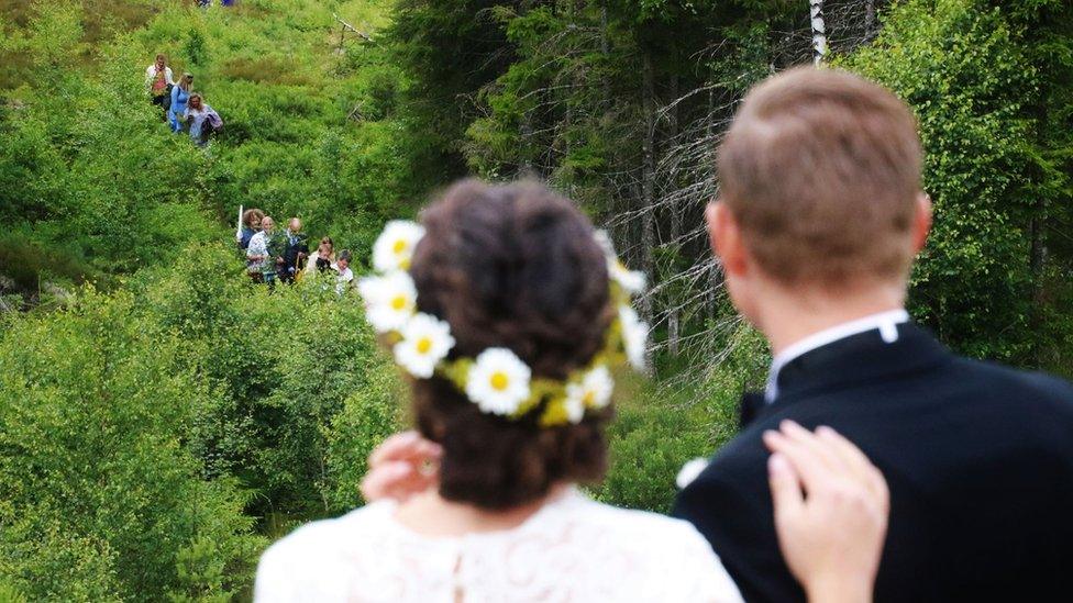 Newlyweds in forest