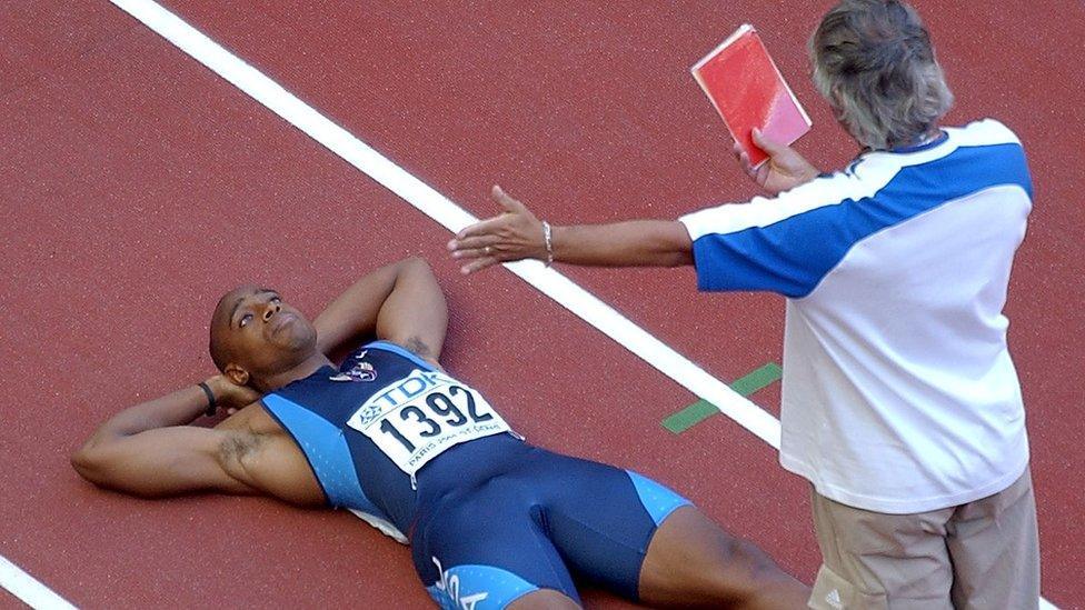 Jon Drummond (left) is disqualified after false starting in the 2003 World Championships.