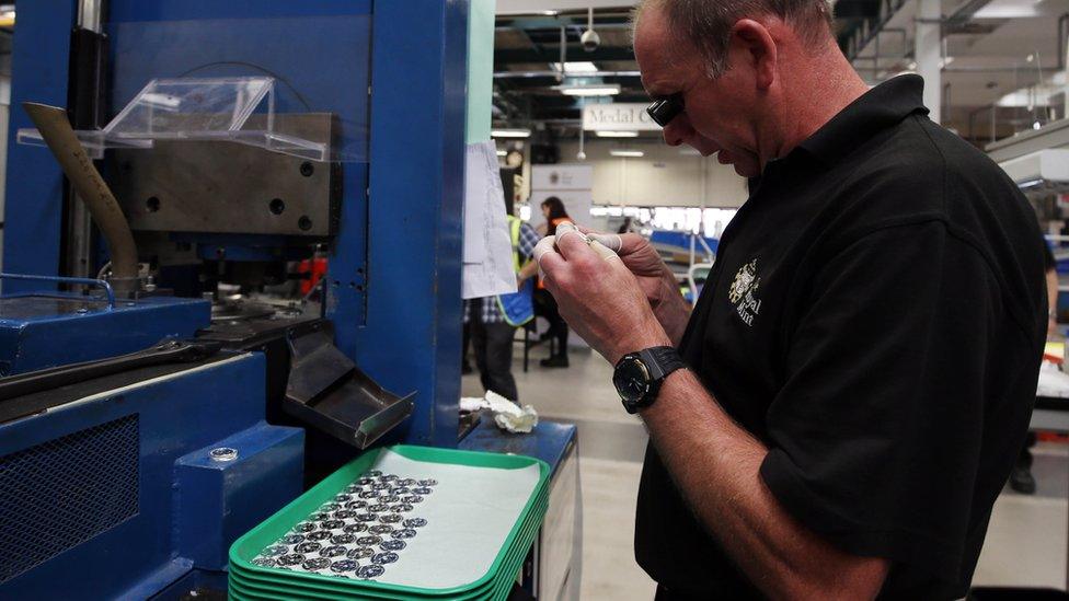 Staff at the Royal Mint in Wales are getting the coins ready