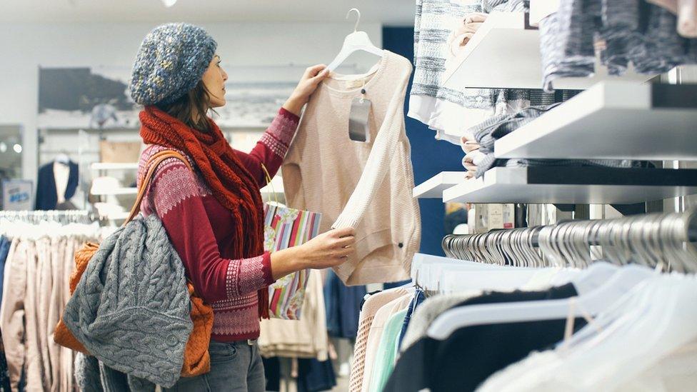 Woman buying clothes