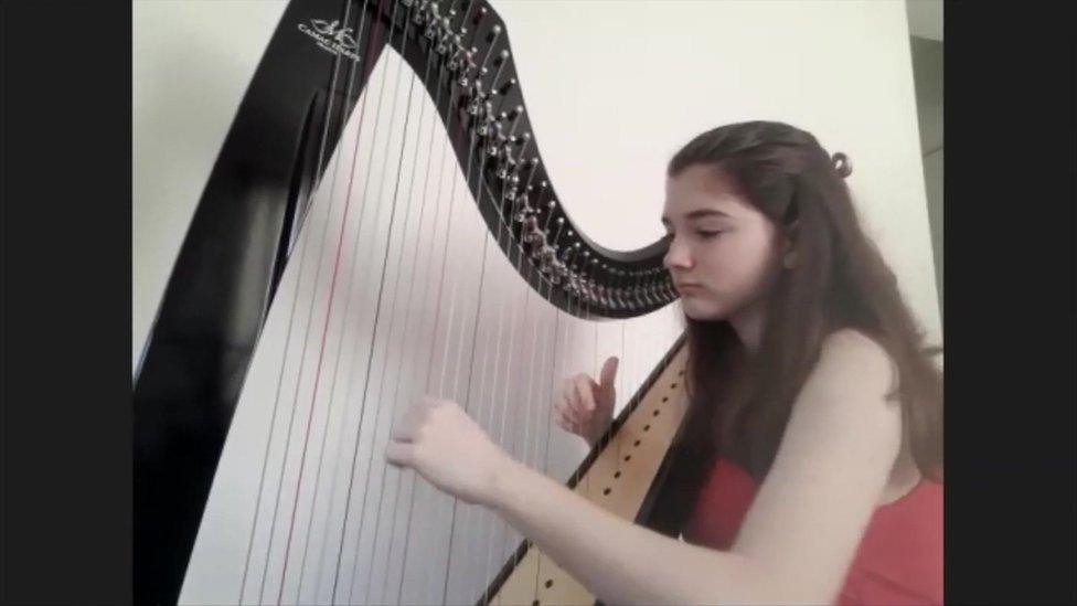 Helen Green, 15, taking her music lesson over Zoom