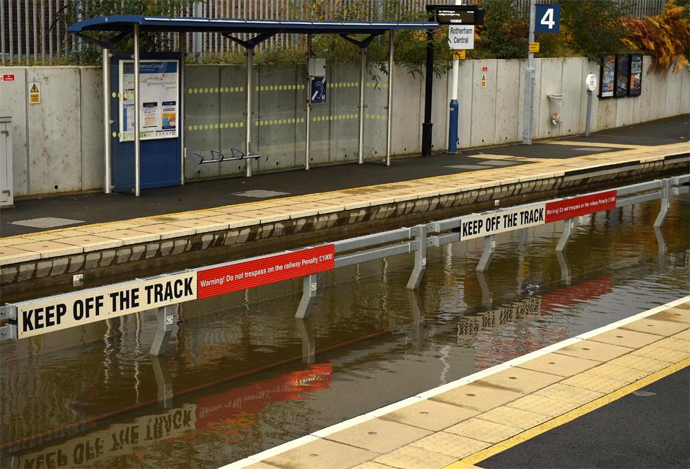 Flood water covering the rail tracks at Rotherham Central train station