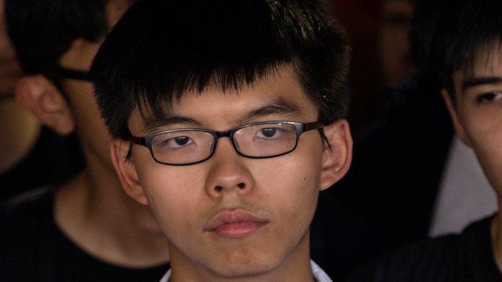 Student leader Joshua Wong speaks to the media outside Hong Kong's High Court in Hong Kong, China, 17 August 2017