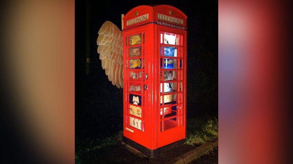 One of the previous designs, the phone box with angel wings