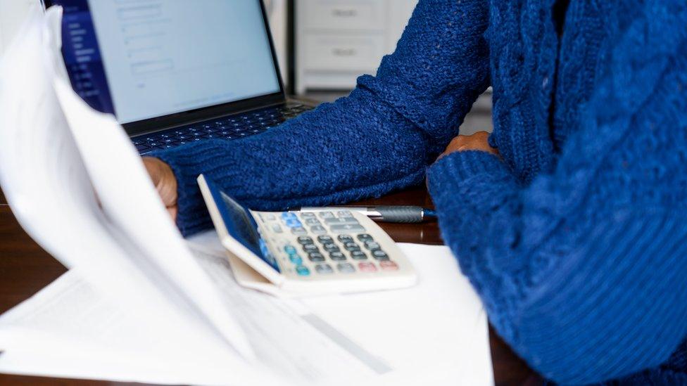 Woman checking her tax return