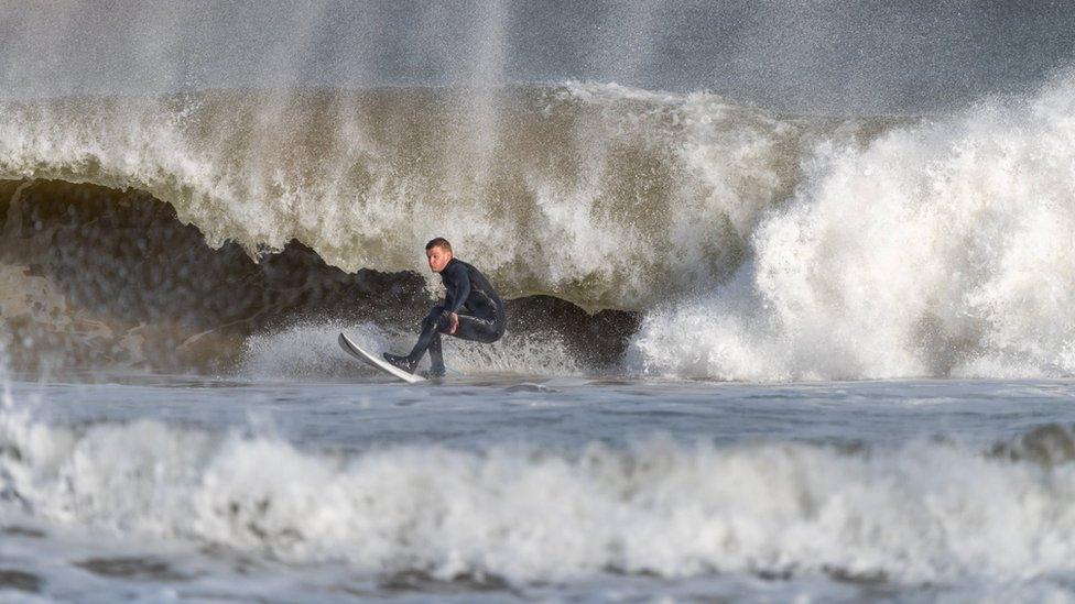 Surfers took advantage of the huge swells on the Irish coastline