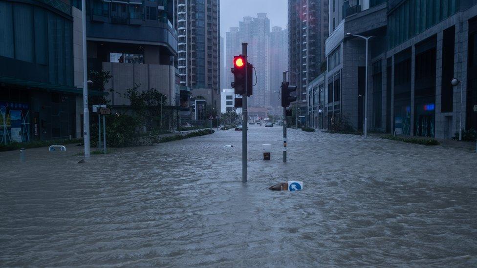 A Hong Kong streets filled with knee-deep water