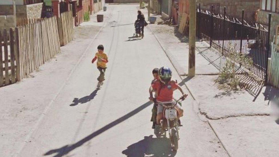 Children playing near the Atacama Desert in Chile