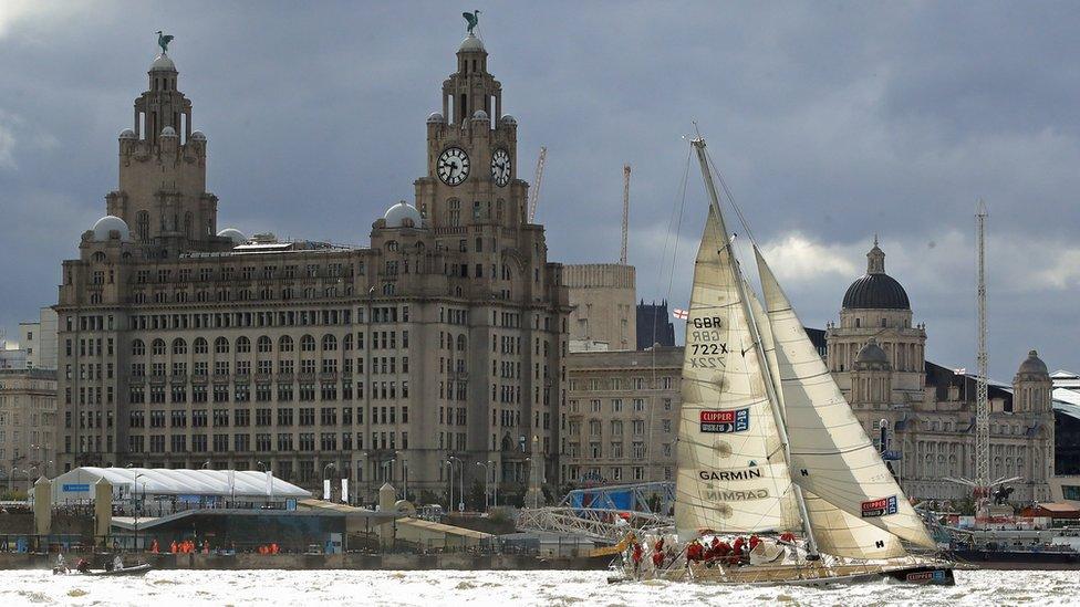 The Garmin team wins a "sprint finish" to conclude the Clipper 2017-2018 Round the World Yacht Race outside the Royal Albert Dock in Liverpool