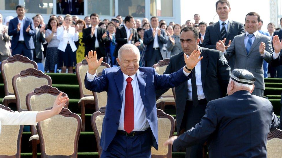 Uzbekistan's President Islam Karimov (C) dances during a state celebration of the Nowruz holiday marking the beginning of spring in Tashkent on March 21, 2015