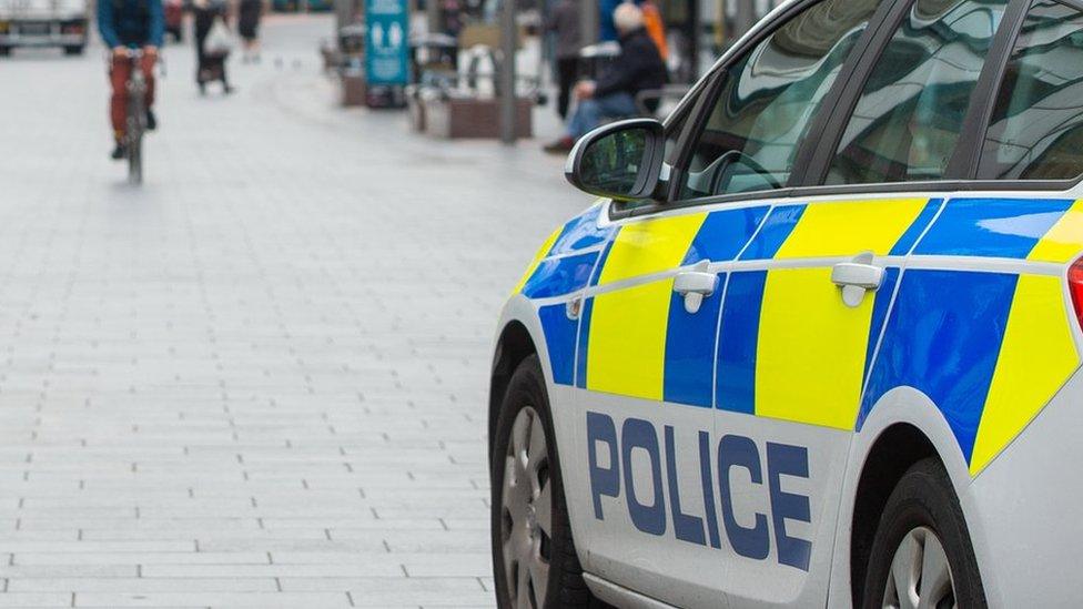 A police car in Leicester city centre