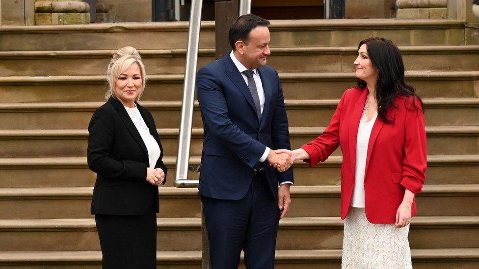 Michelle O'Neill, Leo Varadkar and Emma Little-Pengelly on the steps of Stormont Castle