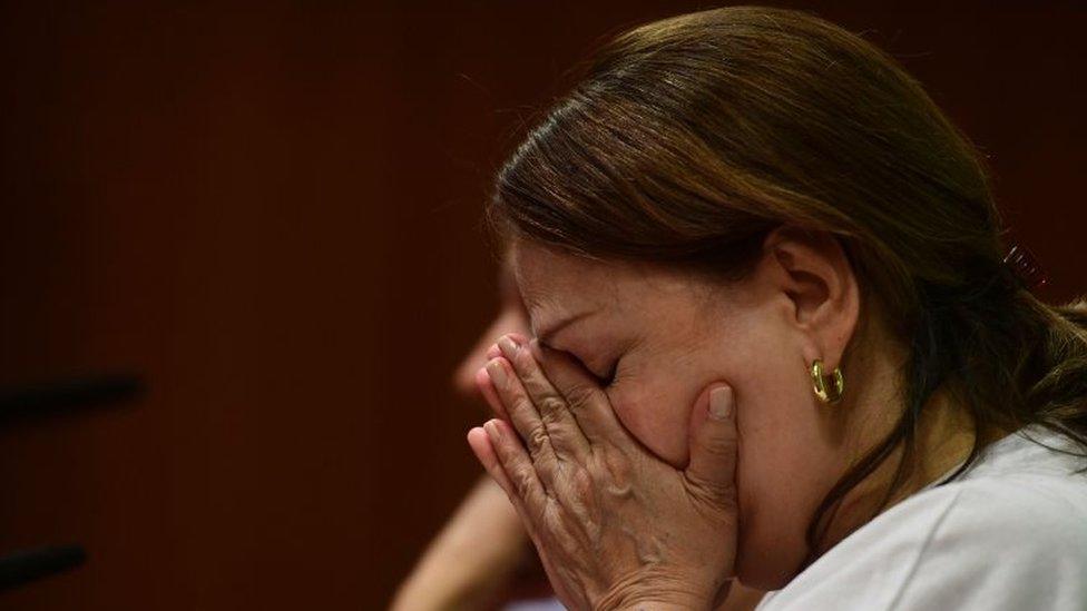 Wife of prominent opposition leader and mayor of Caracas Antonio Jose Ledezma, Mitzy Capriles, wipes her eyes during a press conference in madrid on August 1, 2017 after her husband was arrested overnight by the Venezuelan intelligence service (Sebin) in Venuezuela a day after a vote to choose a much-condemned assembly that supersedes parliamen