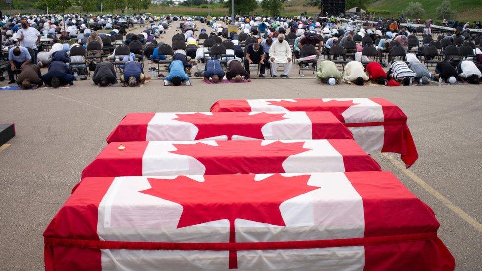 A funeral is held for the Afzaal family