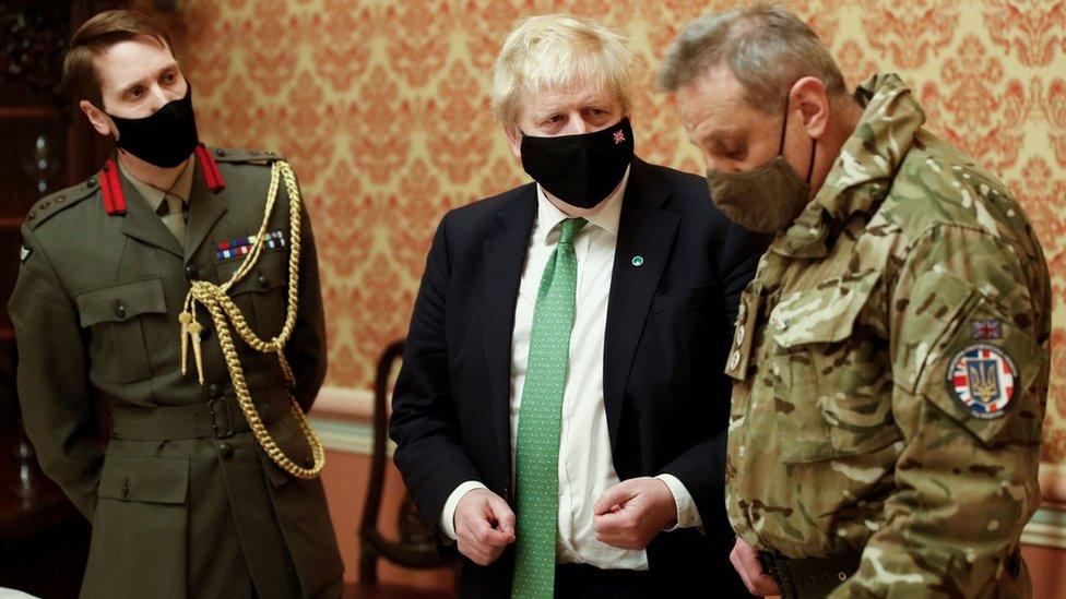 Boris Johnson attending a military briefing in Kyiv