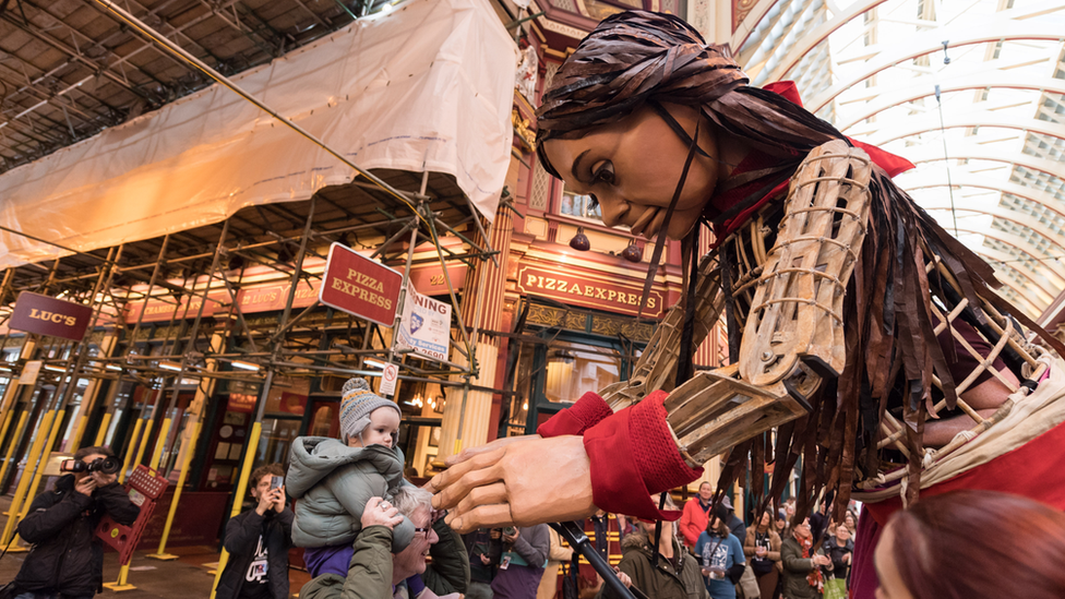 Little Amal greeted friends in Leadenhall Market