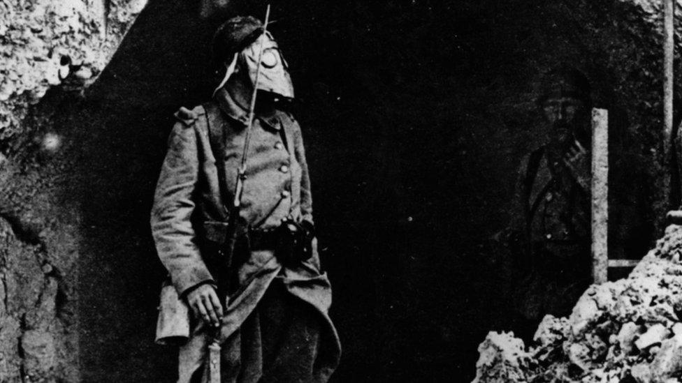 A French soldier at the Battle of Verdun, wearing a gas mask.