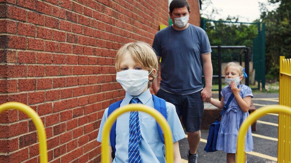 children-going-to-school-in-masks