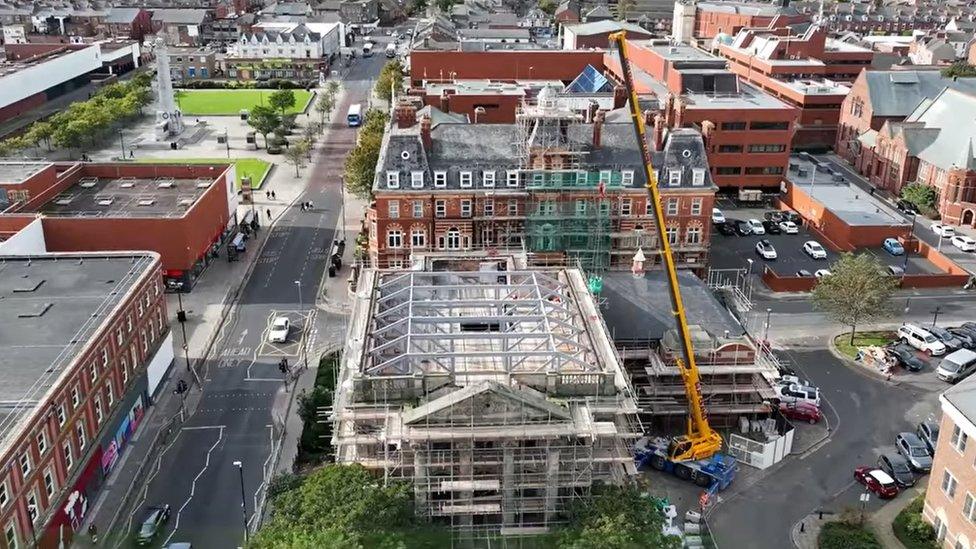 An aerial shot of the building before the fire