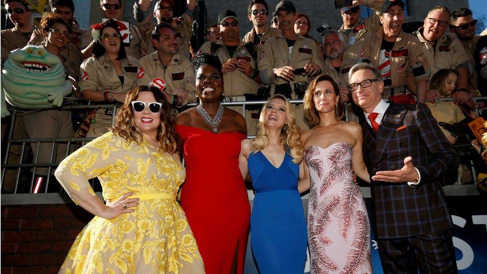 Director Paul Feig poses with cast members (L-R) Melissa McCarthy, Leslie Jones, Kate McKinnon and Kristen Wiig at the premiere of the film Ghostbusters in Hollywood