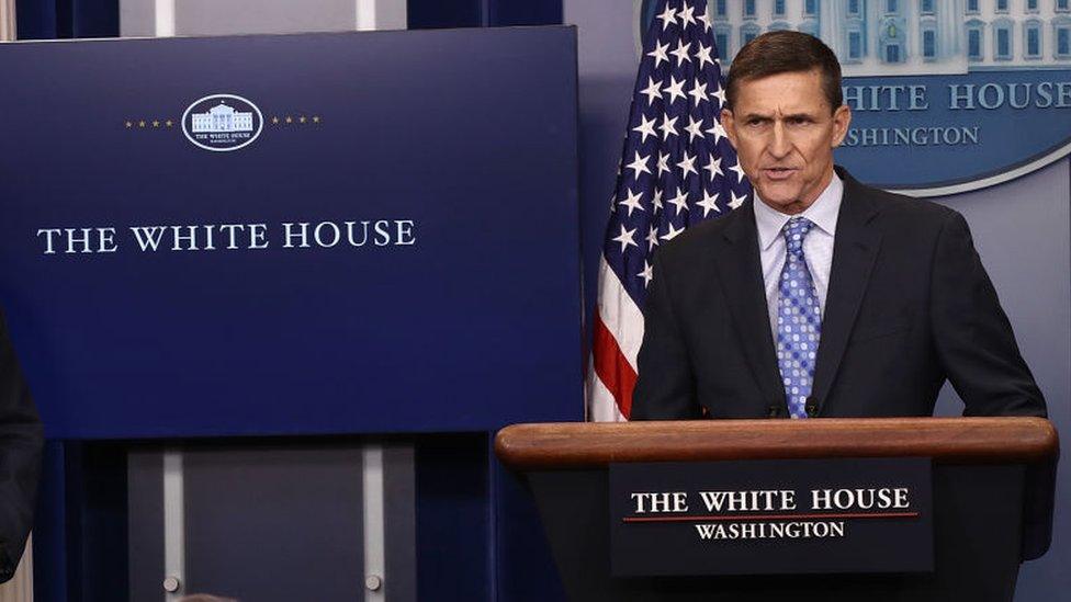 White House Press Secretary Sean Spicer (L) yields the briefing room podium to National Security Adviser Michael Flynn February 1, 2017 in Washington, DC.