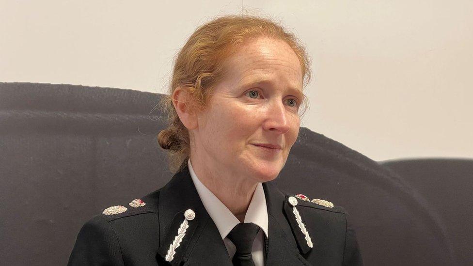 Catherine Roper, chief constable of Wiltshire Police, sitting in her uniform