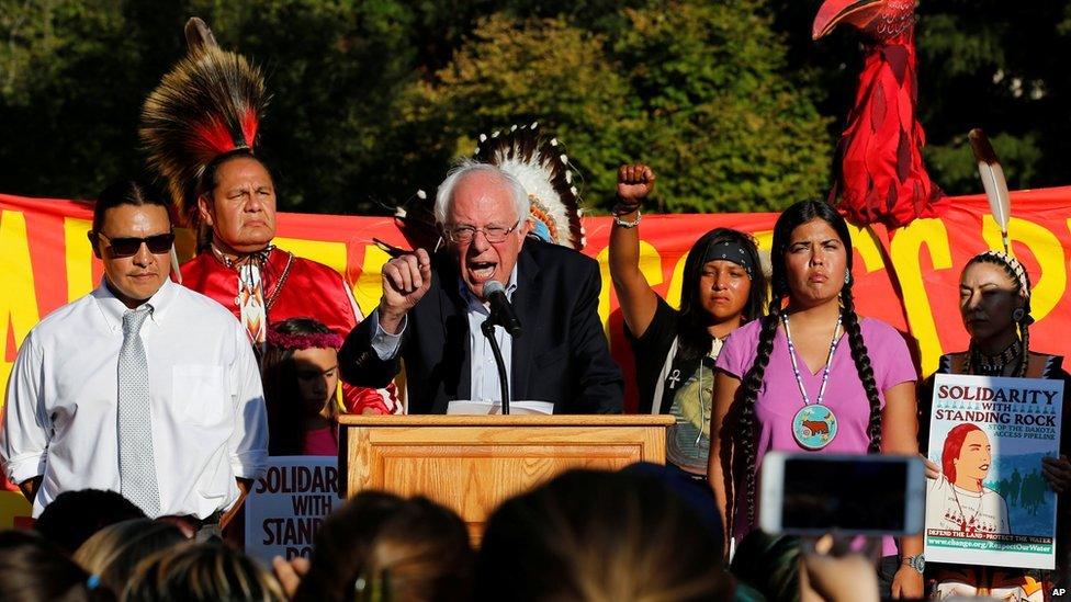 This is a photo of senator Bernie Sanders at a protest in Nortn Dakota.