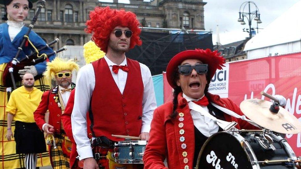 The Absurdist Pipe Band perform during the opening ceremony