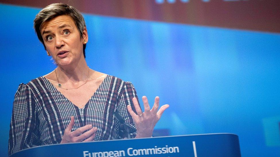 Margrethe Vestager stands at a European Commission podium