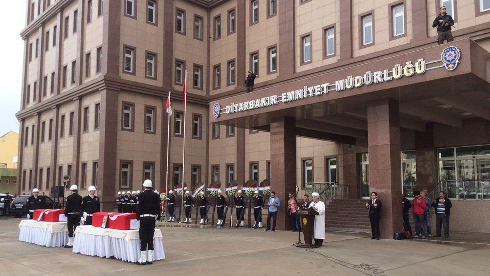 A ceremony is held for two policemen killed in the Diyarbakir attack